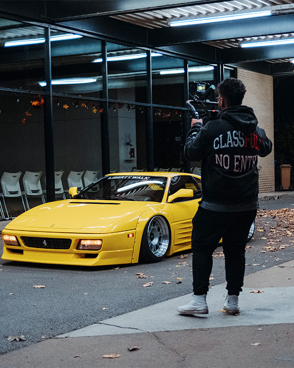Rafhin filming a Liberty Walk Ferrari